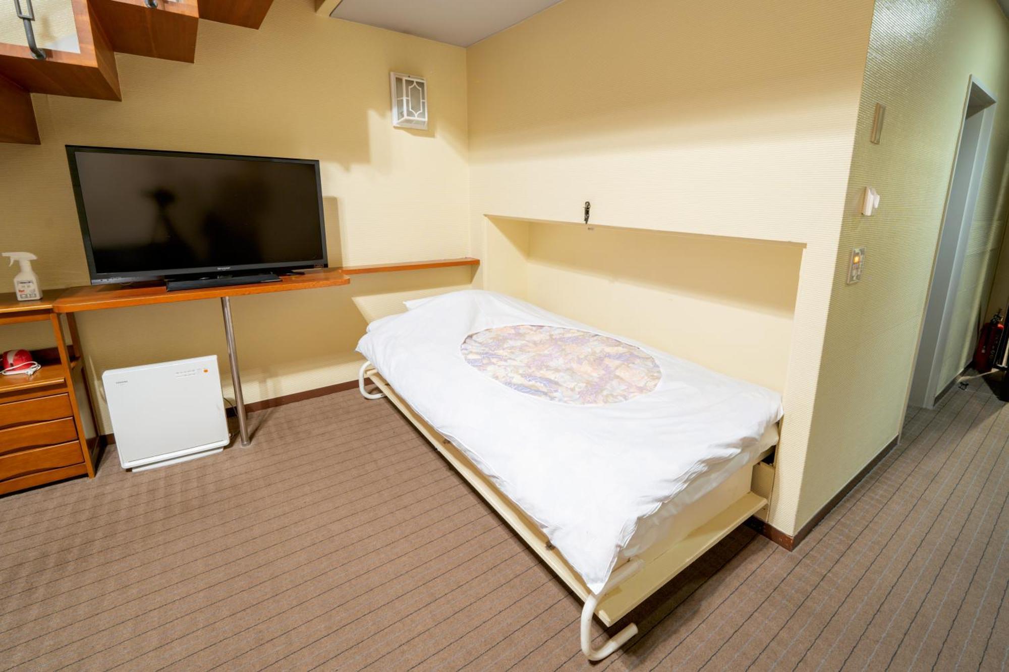 富士祥栄会館 Hotell Oyama  Rum bild